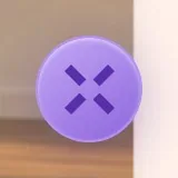 Ask Luna minimised to a small round purple button with the MonstarX X
