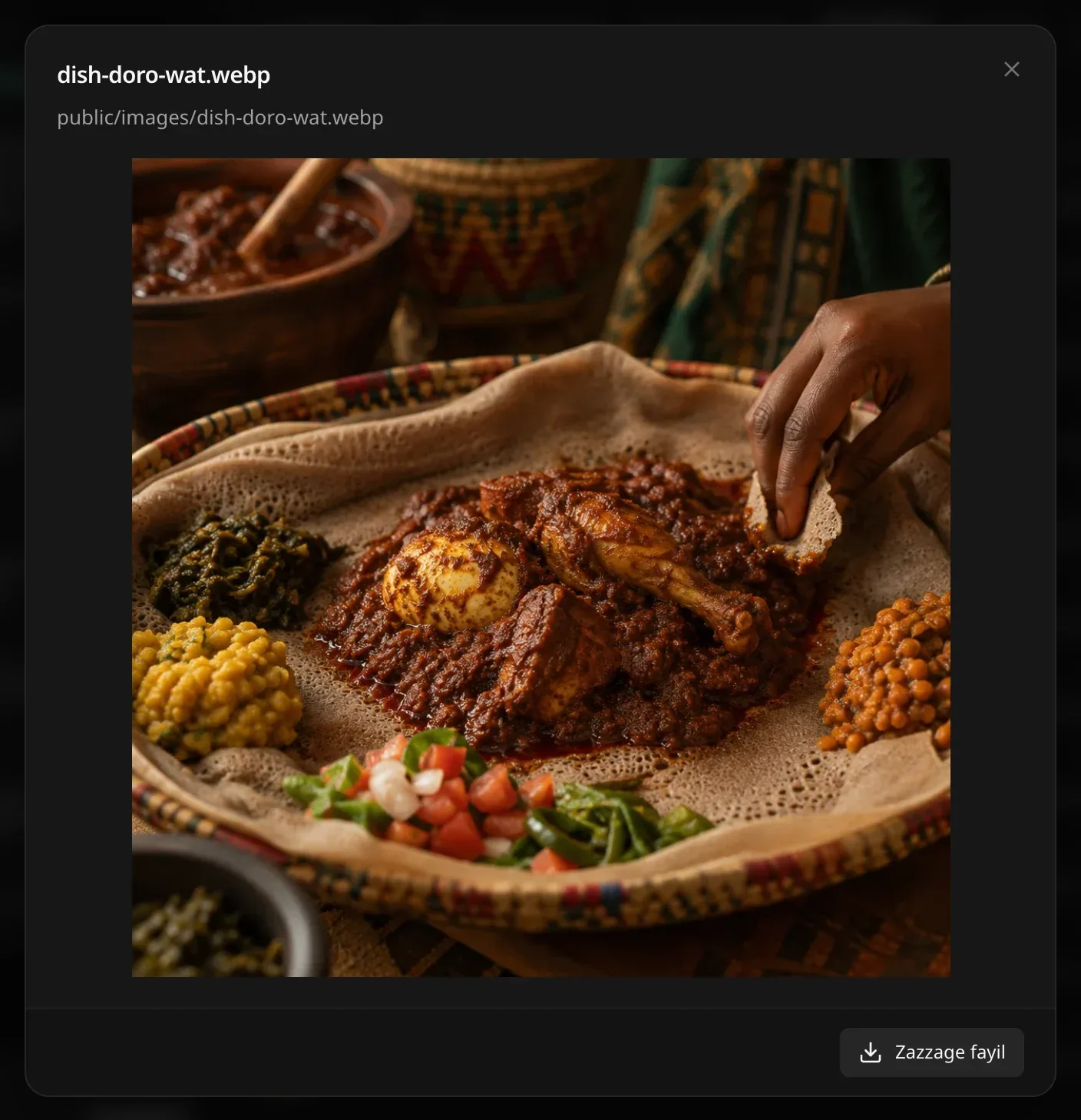 Samfotin dish-doro-wat.webp, hoton Doro Wat da injera, da hanyar ajiyarsa public/images/dish-doro-wat.webp, da maɓallin Zazzage fayil