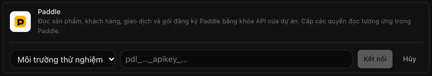 Dòng Paddle đang mở để kết nối: danh sách thả xuống chọn Môi trường thử nghiệm hoặc Môi trường chính thức, trường khóa API còn trống, cùng hai nút Kết nối và Hủy