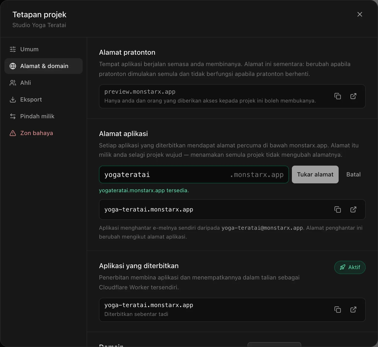 Medan Alamat aplikasi dengan yogateratai ditaip, nota hijau yogateratai.monstarx.app tersedia., serta butang Tukar alamat dan Batal